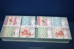 Two boxes of Cath Kidson mugs in well known Cath Kidson patterns; pink rose, blue polka dot,