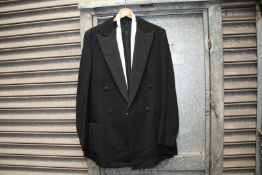 A black Dress Suit with a Marcella waistcoat, 42'' chest, trousers 34'' waist x 31'' leg.