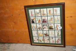 A framed and mounted set of 25 Players 'Famous Beauties' cigarette cards, glass to back cracked.