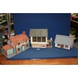 Three model wooden houses including Kenchester Station.