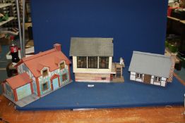 Three model wooden houses including Kenchester Station.