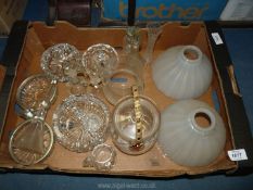 A quantity of glass including a pair of milk glass shades (one repaired), heavy cut glass ashtrays,