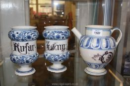 A pair of wide rimmed blue and white ceramic Apothecary jars, some chips to base,