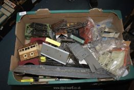 A quantity of model train track, buildings, kits and scenery .