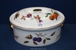 A large Royal Worcester Evesham oval lidded casserole dish.