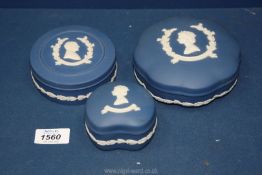 Three pieces of dark blue Wedgwood Jasperware including 3 candy pots and lids commemorating the