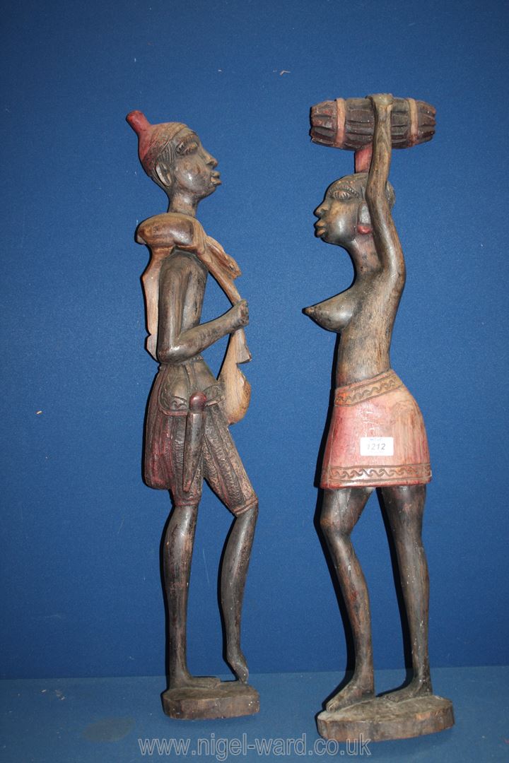 Two African wooden wall hanging carvings of figures, one a/f., 29" tall.