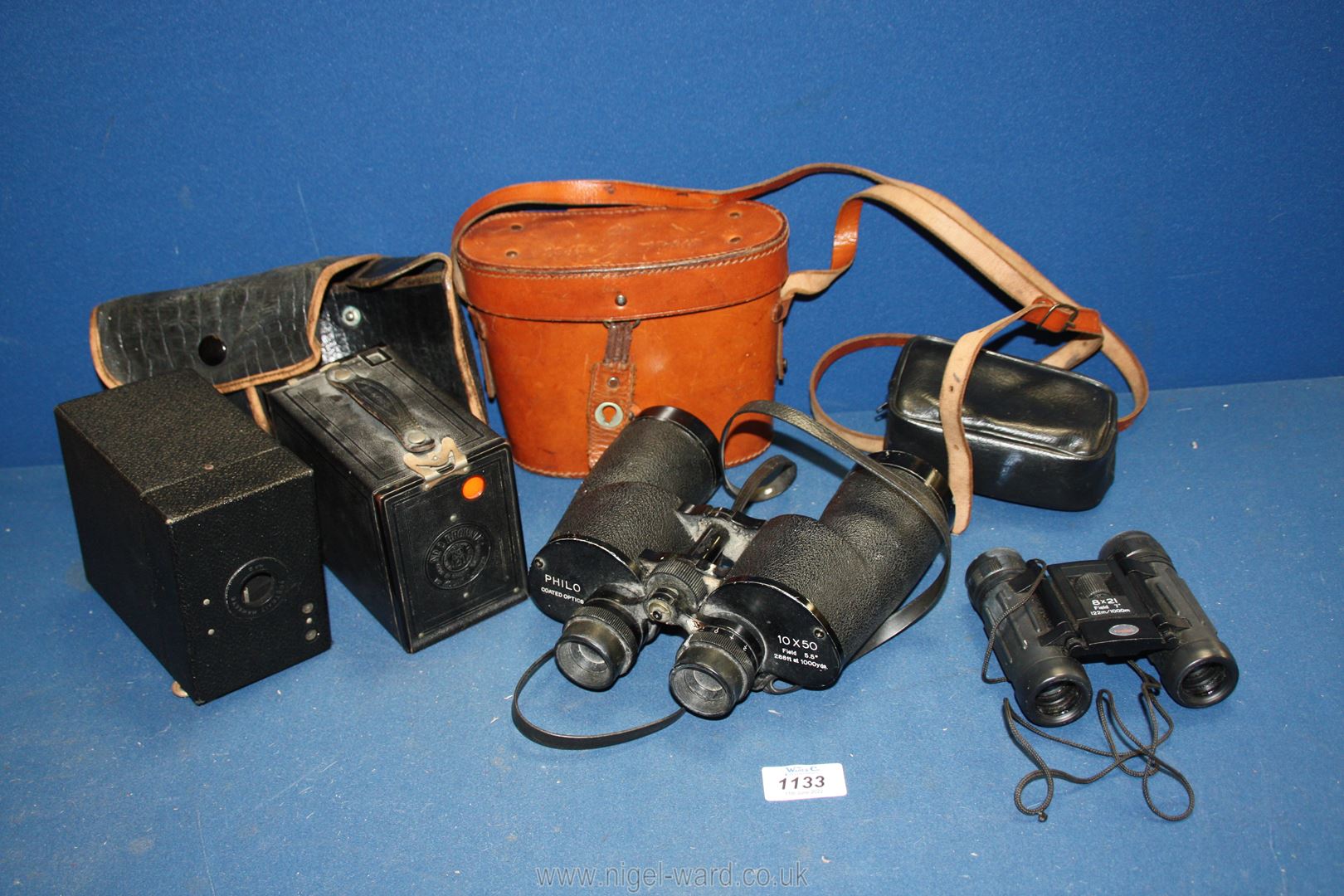Two pairs of Binoculars including Philco 10 x 50, field 5.5 and 8 x 21 in black pouch, No.
