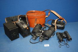 Two pairs of Binoculars including Philco 10 x 50, field 5.5 and 8 x 21 in black pouch, No.