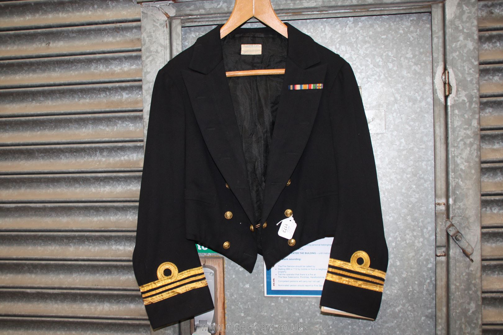 A Royal Navy Dress uniform jacket I and II World War; Lieutenant Commander, many medal ribbons,
