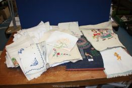 A small quantity of embroidered table ware including table cloths, place mats etc.