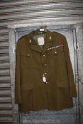 A British Army Dress uniform jacket; Staff Sergeant Roberts, including medal ribbons,