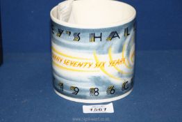 A limited edition Halley's Comet Wedgwood mug with box, designed by Richard Guyatt, no. 1114/2000.