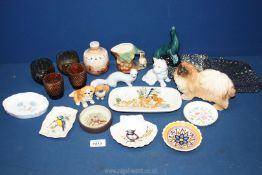 A quantity of china including Jersey pottery vase, Poole seal, USSR weasel, etc.