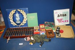 A quantity of games including two packs of Tarot cards, Czech made puppet, a/f, abacus,