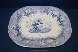 A blue and white floral pattern meat Plate, 18'' x 14'', some crazing.