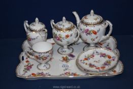 A Dresden style Tea for One set complete with footed teapot, cup, jug and sucrier with lid,