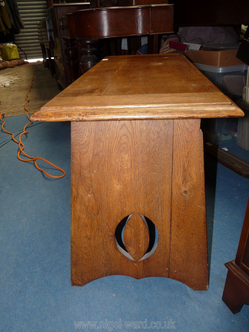 A heavy Oak six plank Arts and Crafts locker/chest having splayed fretwork detailed slab ends, - Image 3 of 3