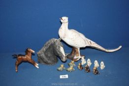 A small quantity of Wade Whimsies dogs including poodles, aslatians and puppies,