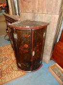 A cylinder fronted double doored dark lacquered wall hanging Corner Cupboard decorated with figures