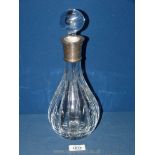 A silver necked Decanter with hallmarks for Sheffield 2012, maker R. Carr Ltd, with stopper.