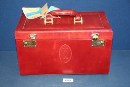 A 1950's red leather Vanity case, Pan Am labels and key, 13" wide x 7" deep x 7 1/2" tall.