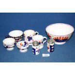 A quantity of Gaudy Welsh china including salt & pepper, two small mugs, cup, dish etc.