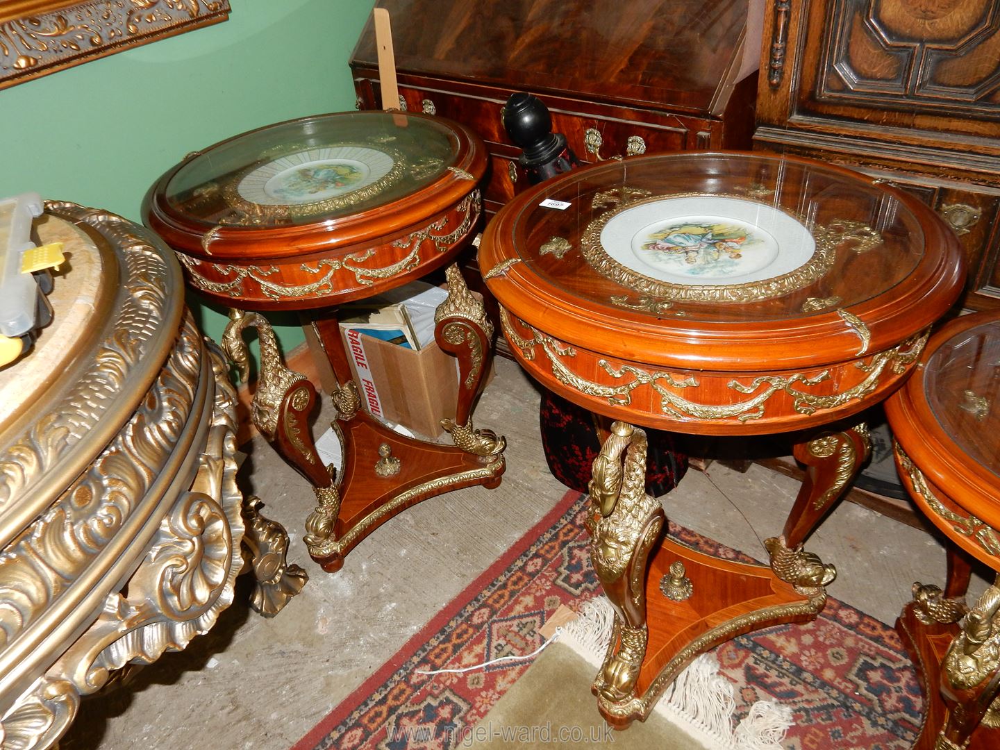 A pair of ornate mixed wood Occasional Tables,