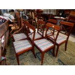 A set of six elegant Mahogany framed Dining Chairs having cross back-splats surmounted by light and