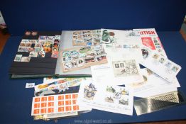 A box of stamp related miscellanea to include a book of 1st class stamps (20),