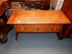 A heavy Oak six plank Arts and Crafts locker/chest having splayed fretwork detailed slab ends,