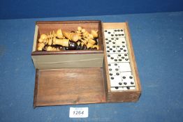 A wooden Chess set and Dominoes.
