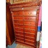 A Mahogany tall Chest of sixteen short Drawers with drop handles,