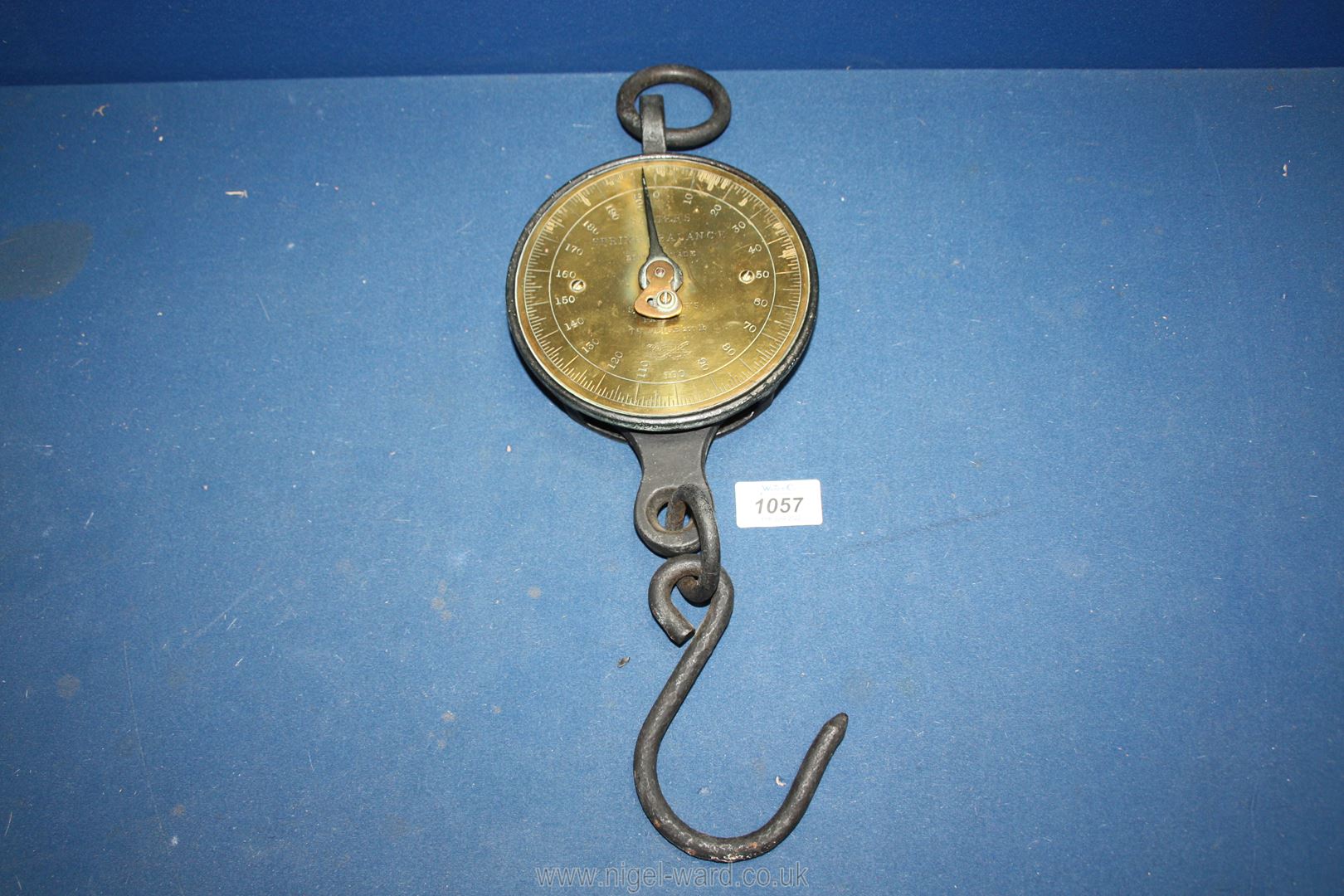 A heavy cast iron and brass Salters Spring Balance, scales up to 200lb weight.