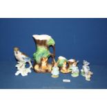 A Beatrix Potter 'Mrs Flopsy Bunny' figure by Beswick, Wade Tom and Jerry figures, Hornsea vases,