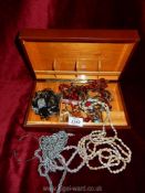 A quantity of costume jewellery including shell necklaces and bracelet,