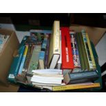 A box of books including Lord of The Rings and 'The Hobbit Companion Book',