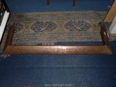 An Arts & Crafts copper fire surround, 49" long x 15 1/4" deep.