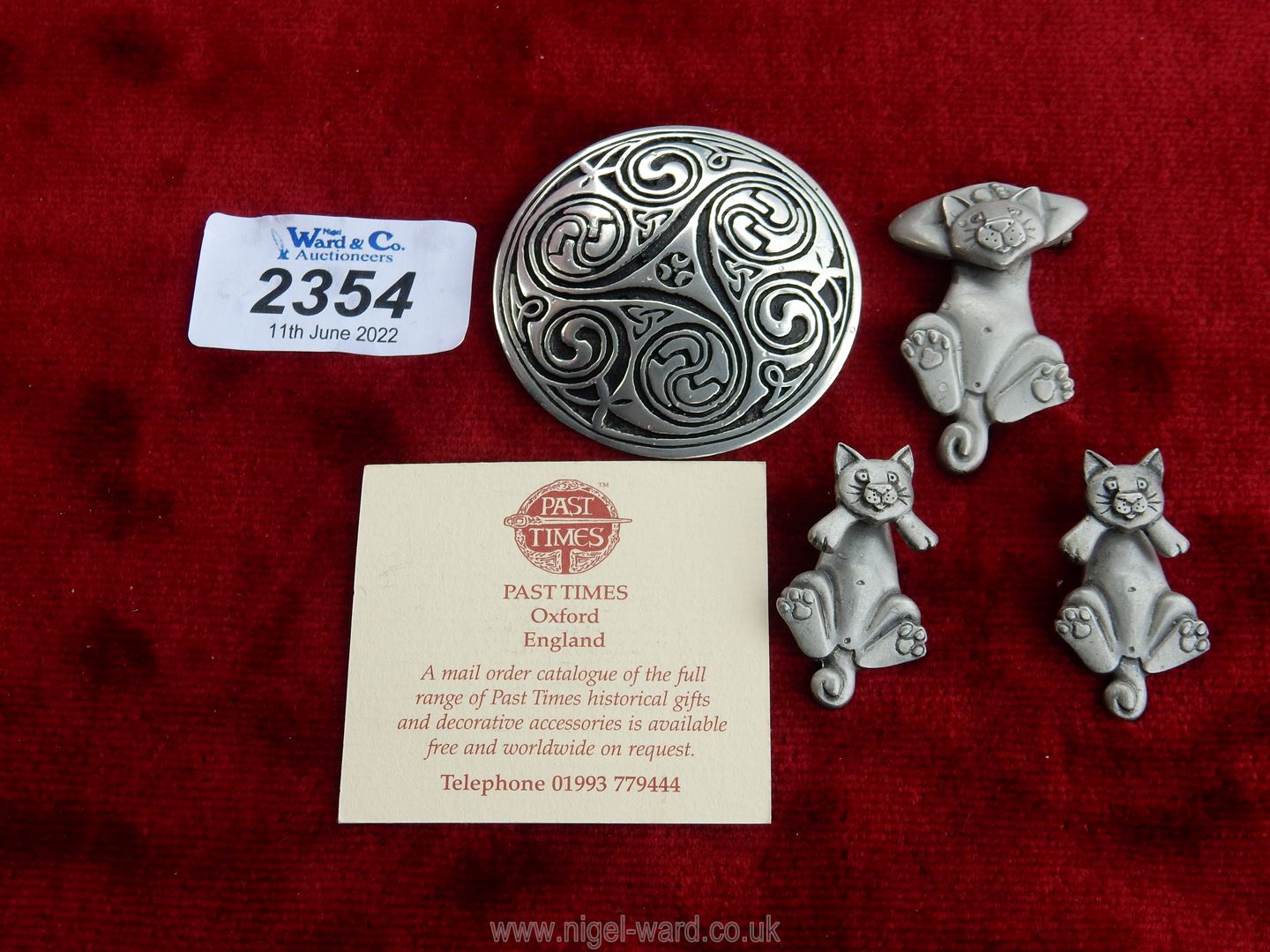 A Pastimes pewter Celtic swirl brooch inspired by the Book of Kells,