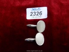 A pair of silver Cufflinks with hallmarks for Birmingham by S.J.