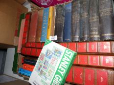 A box of books including Poetry, Stanley Gibbons stamp books etc.