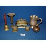 A small quantity of metals including brass bells, copper vase with figures in relief,