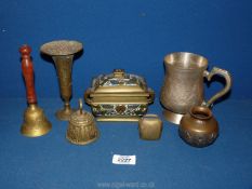 A small quantity of metals including brass bells, copper vase with figures in relief,