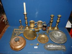 A quantity of brass and copper including candlesticks, hot water bottle, bracket.
