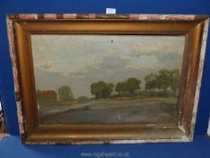 A framed Oil on canvas depicting a country landscape of moorland and trees, no visible signature,