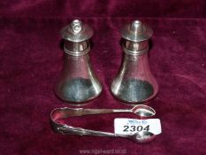 A pair of Silver salt shakers, Birmingham 1909, makers mark indistinct, possibly G.E. Walton & Co.