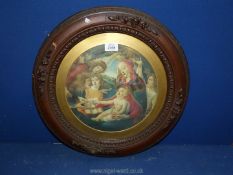 A circular wooden framed print depicting 'Madonna of the Magnificat',19" diameter,