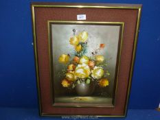 A framed Oil on canvas depicting still life of flowers in brown vase, signed S.
