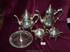 A four piece plated tea and coffee set by M & R and a cake stand.