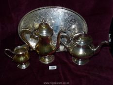 A Sheffield plate galleried tray, together with an Epns three piece Teaset including; teapot,
